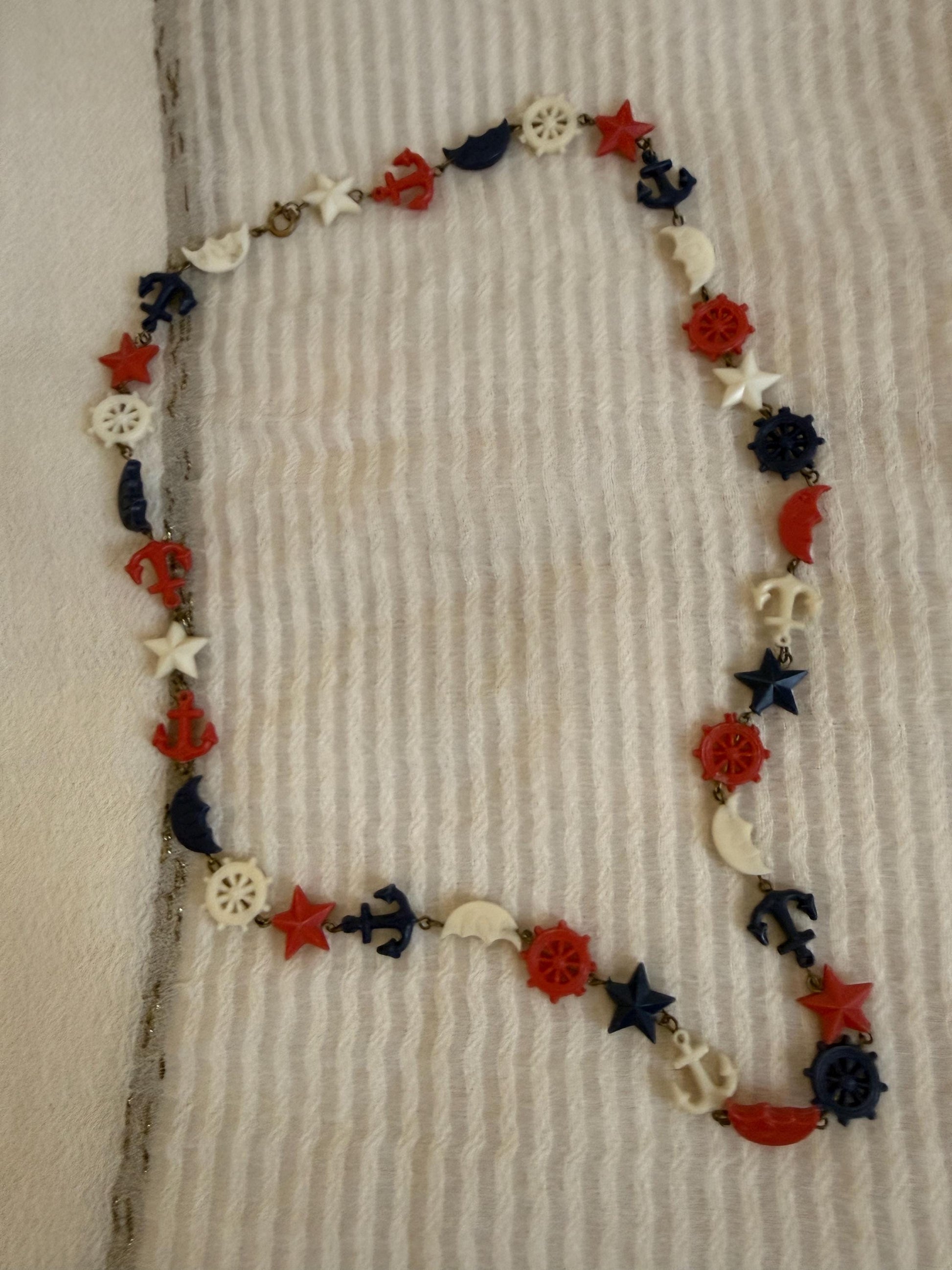 Vintage 1940s Nautical Charm Necklace, Red White Blue Plastic Necklace, Anchor Ship Wheel Star Jewellery