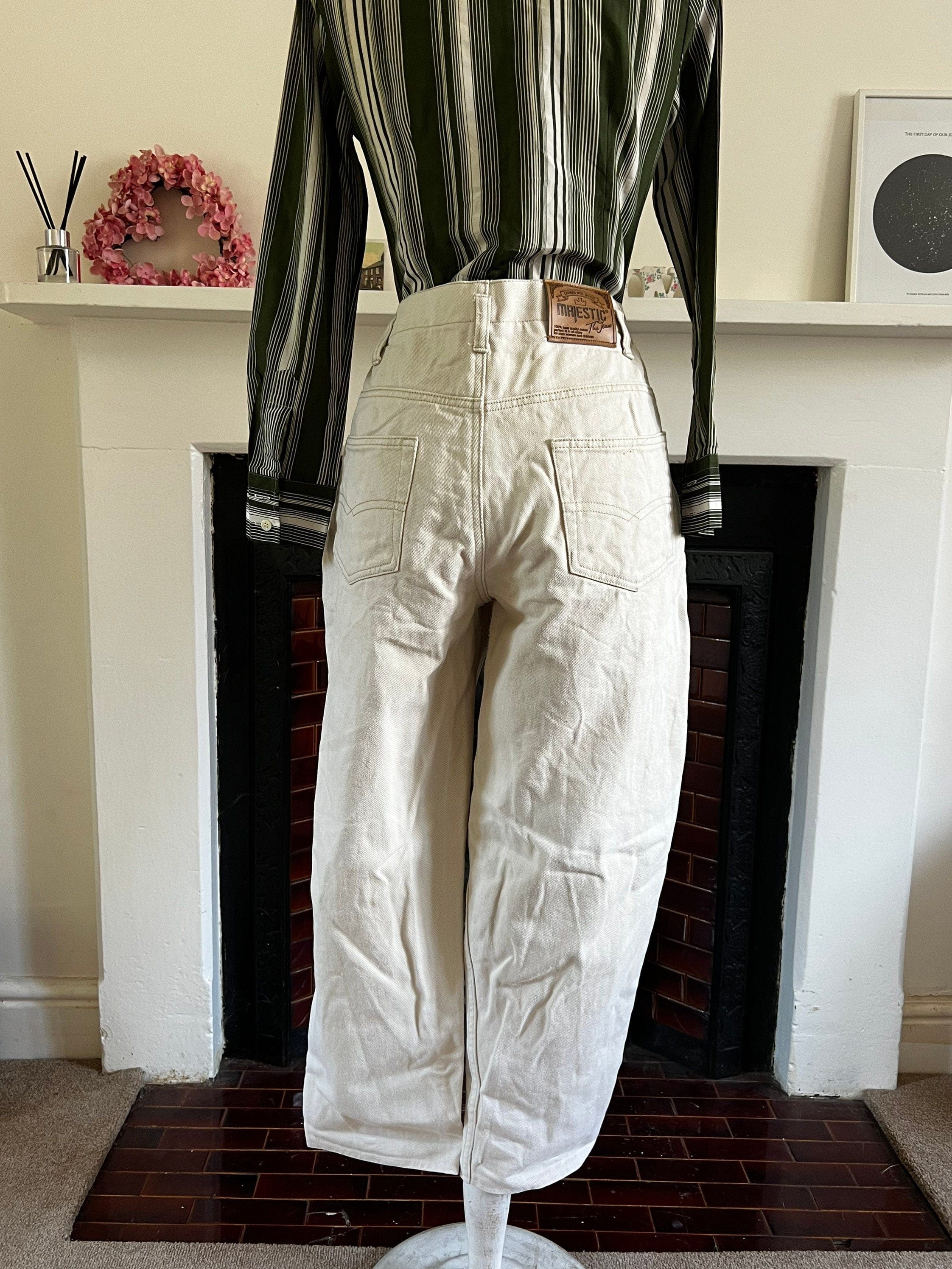 Stretchy white jeans clearance